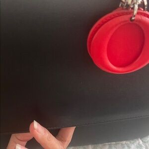 Elegant Black Shoulder Bag with Red Accent